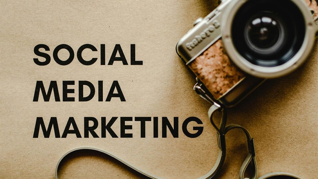 a Design showing a camera and text: Social Media Marketing