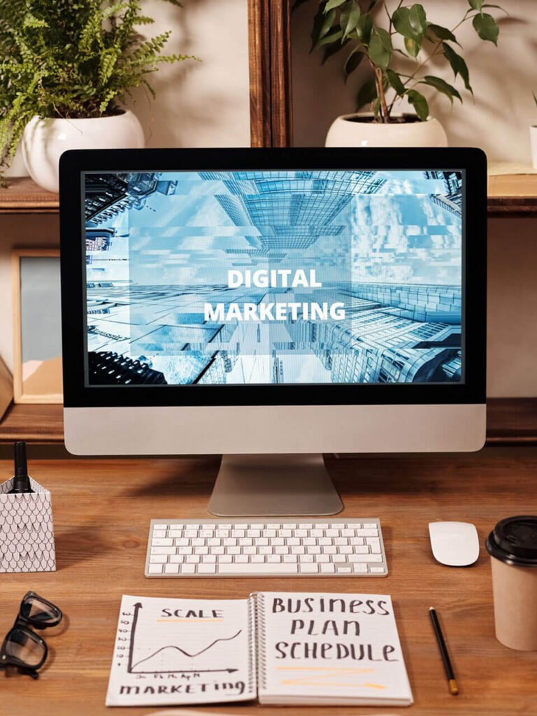 A Photo of a PC screen with the words digital marketing written