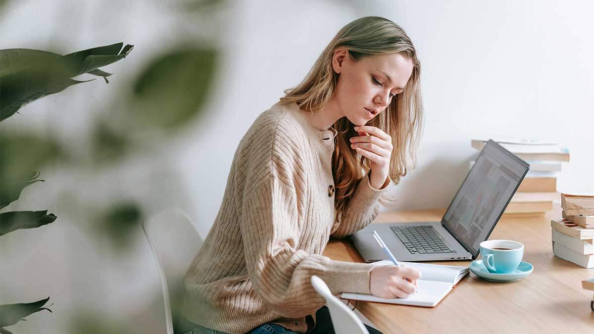 photo of a Woman Preparing a marketing strategy